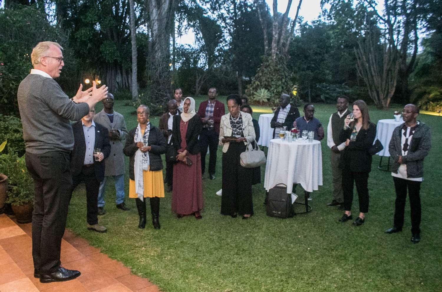  Clothing, Formal Wear, Suit, Grass, Plant, People, Person, Adult, Male, Man, Tuxedo, Dress, Blazer, Coat, Jacket, Tree, Accessories, Bag, Handbag, Footwear, Shoe, Crowd, Photography, Flower, Flower Arrangement, Flower Bouquet, Vegetation, Glasses, Outdoors, Lawn, Face, Head, Portrait, Ruth Beitia, John Dumelo, Amadou Ali