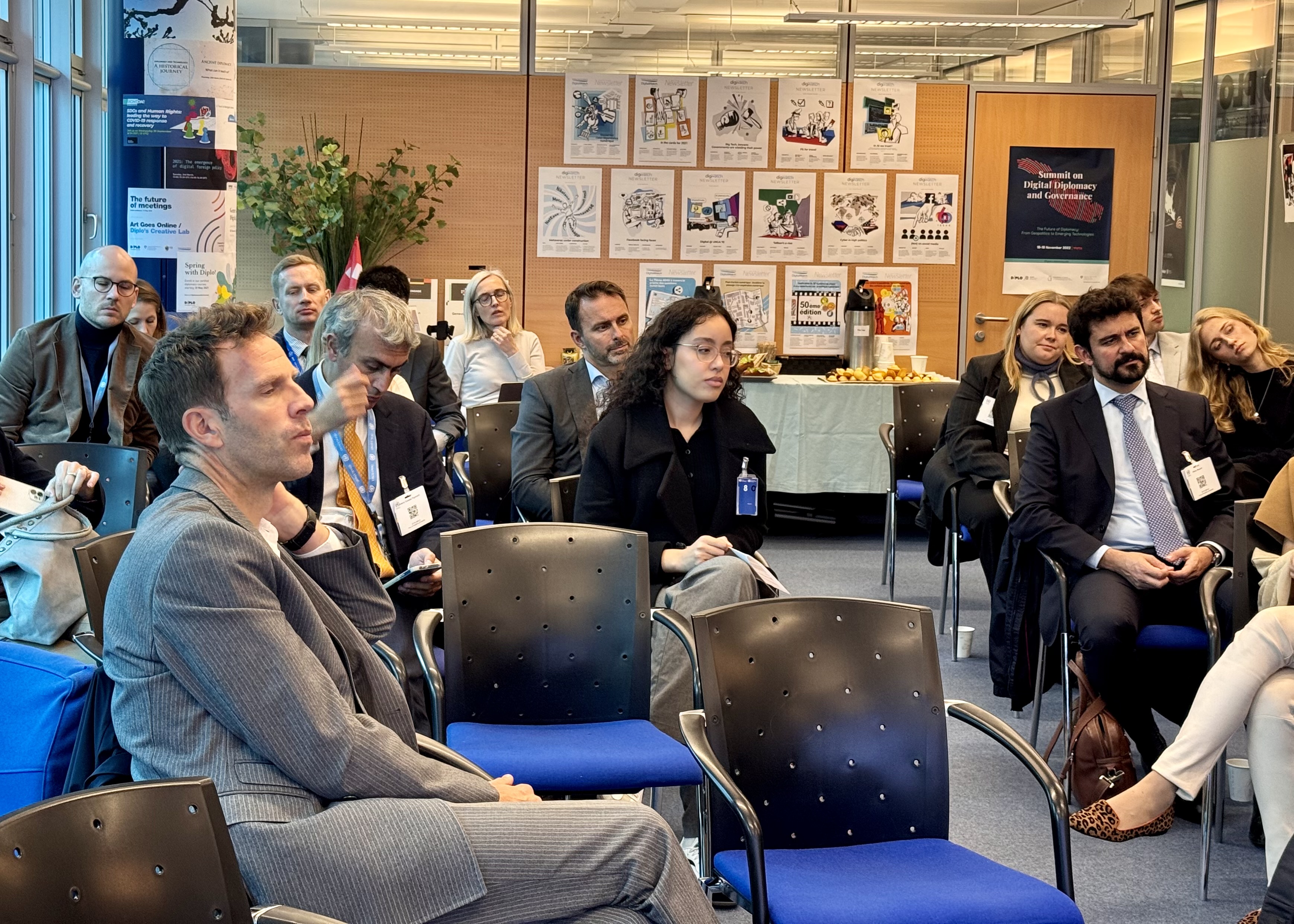  People, Person, Adult, Female, Woman, Accessories, Glasses, Male, Man, Crowd, Wristwatch, Chair, Furniture, Bag, Handbag, Clothing, Footwear, Shoe, Indoors, Formal Wear, Tie, Suit, Cup, Pen, Audience, Lucas Bernardi, Benito Floro, Malkoçoğlu Bali Bey, Jesper Lundgaard, David Guttenfelder, Laura Räty, Galt Niederhoffer, Emma Knyckare