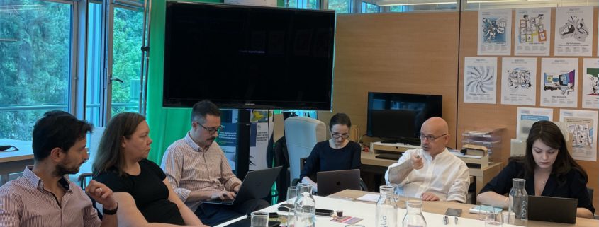 Our story 7 Adult, Female, Person, Woman, Male, Man, Accessories, Glasses, Computer Hardware, Electronics, Hardware, Monitor, Screen, Computer, Laptop, Pc, People, Face, Head, Jewelry, Necklace, Cup, Mobile Phone, Phone, Indoors, Crowd