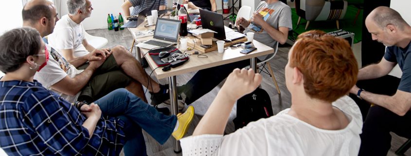 Our story 6 Adult, Male, Man, Person, Boy, Teen, Computer, Electronics, Laptop, Pc, People, Face, Head, Mobile Phone, Phone, Indoors, Furniture, Table, Cup, Computer Hardware, Hardware, Mouse, Spencer Antle