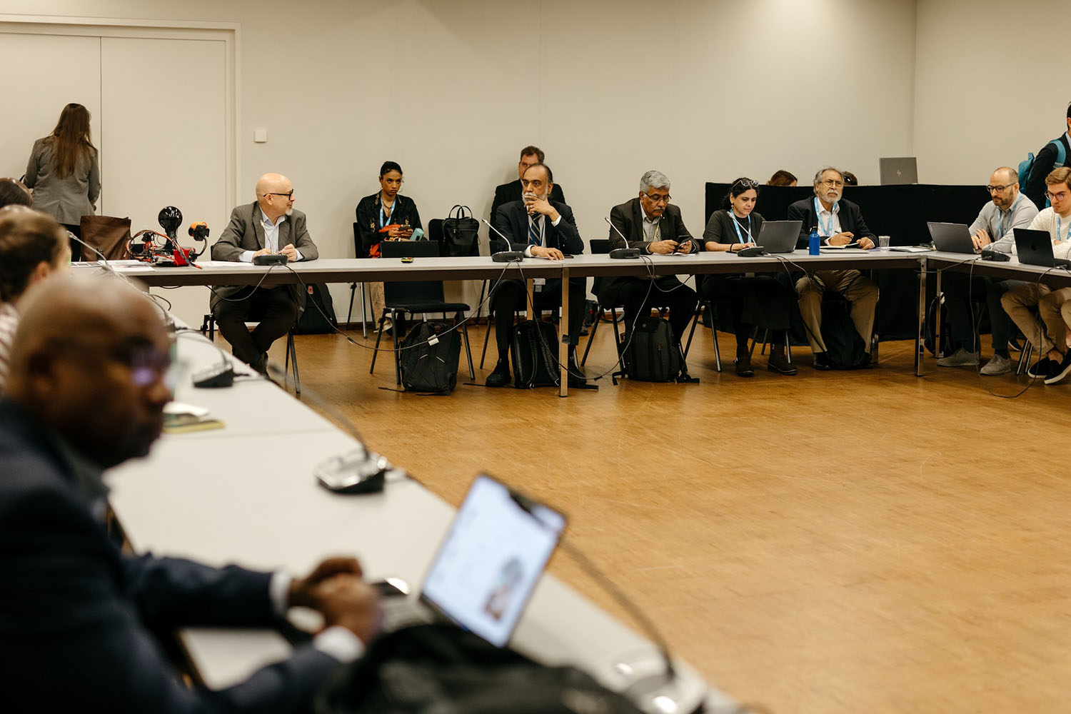 Diplo/GIP at the WSIS+20 High-Level Event 2025 6 Crowd, Person, People, Adult, Male, Man, Audience, Debate, Speech, Computer, Electronics, Laptop, Pc, Face, Head, Clothing, Formal Wear, Suit, Indoors, Accessories, Glasses, Bhalchandra Nemade, Wojciech Kasperski, Trivendra Singh Rawat, Luiz Felipe Pondé, Timo Andres, Ranjani, Andrés Parra